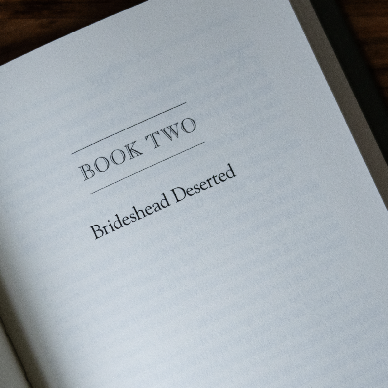 Open book showing the title page of "BOOK TWO Brideshead Deserted" from the book Brideshead Revisited, classic novel published by Word on Fire Classics, hardcover 9781685782382