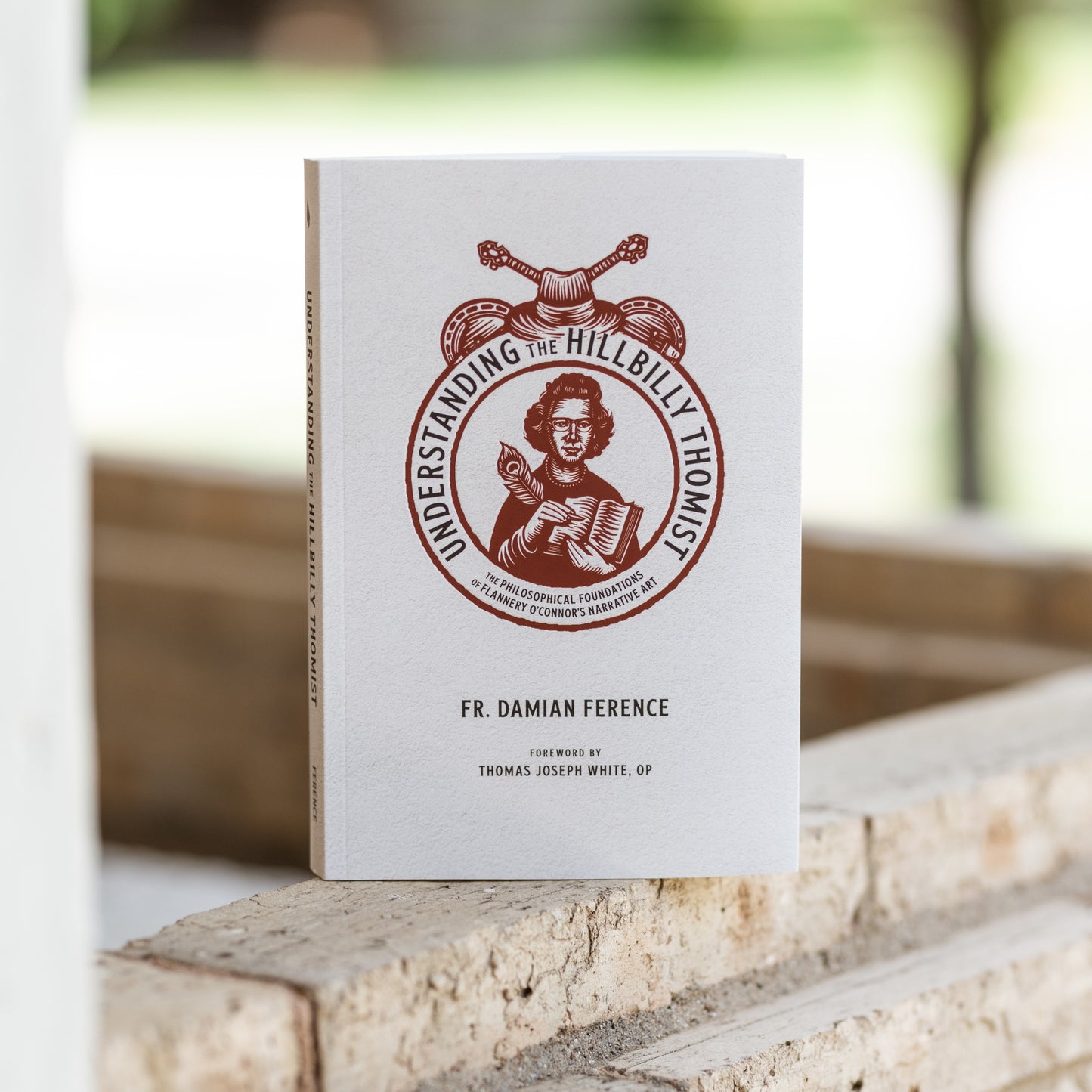 Book titled Understanding the Hillbilly Thomist by Fr. Damian Ference with foreword by Thomas Joseph White OP, The Philosophical Foundations of Flannery O’Connor’s Narrative Art, featuring scholarly endorsements, published by Word on Fire, paperback 9781685780166