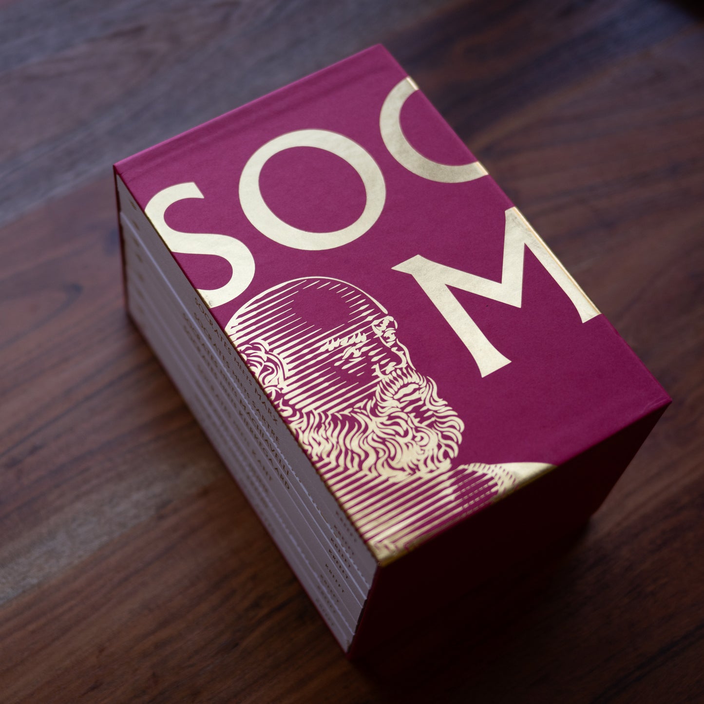 Socrates Meets Box Set with stylized illustration of Socrates on deep red cover, 8 books by Peter Kreeft