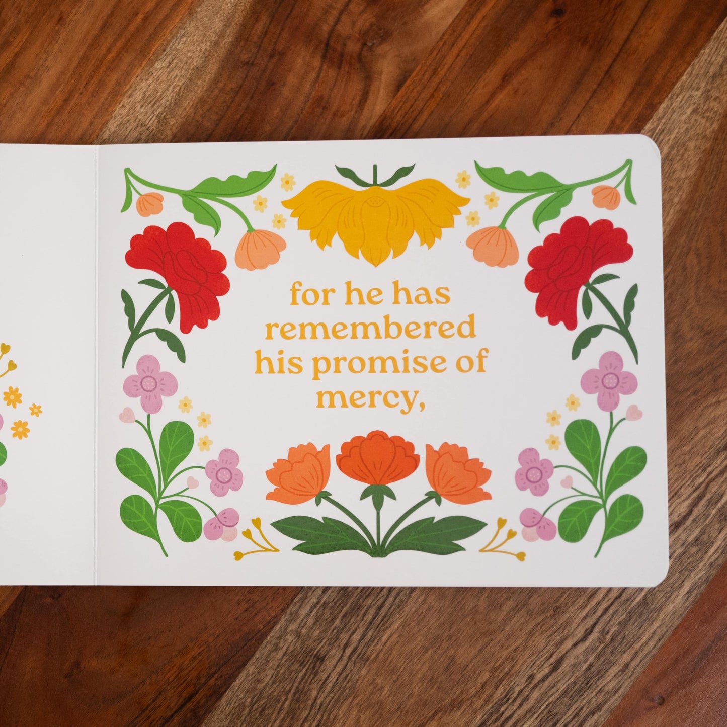 Magnificat Canticle of Mary showing a colorful floral border around the text "for he has remembered his promise of mercy," children's board book for ages 1-5, pray with scripture, 9781685781521