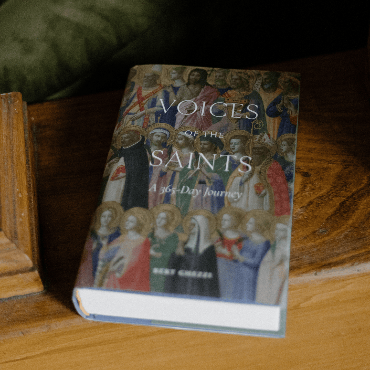 Voices of the Saints: A 365-Day Journey book featuring artwork of saints on the cover, daily devotional for Catholics, hardcover 9781685781163