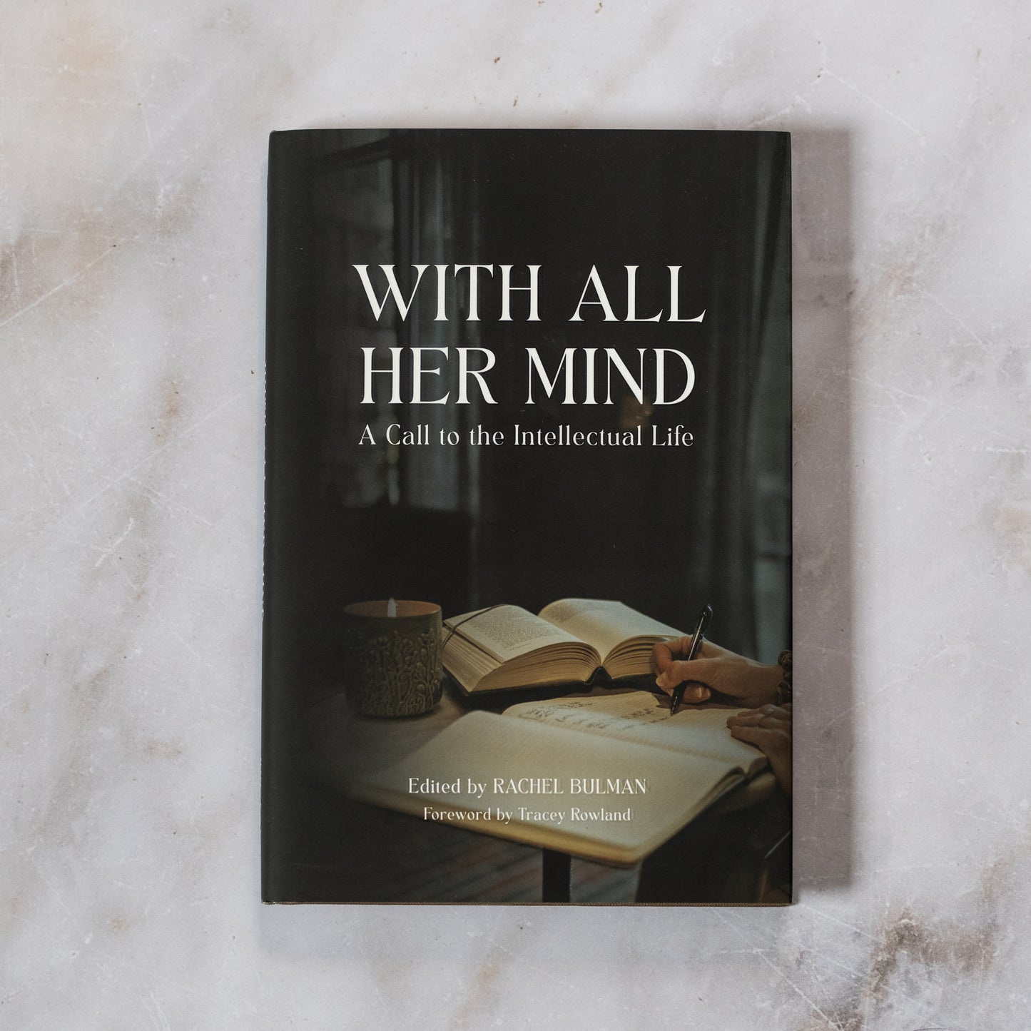 With All Her Mind: A Call to the Intellectual Life book cover shown on a marble surface, edited by Rachel Bulman with a foreword by Tracey Rowland, published by Word on Fire, Catholic book on the feminine genius, hardcover 9781685780159