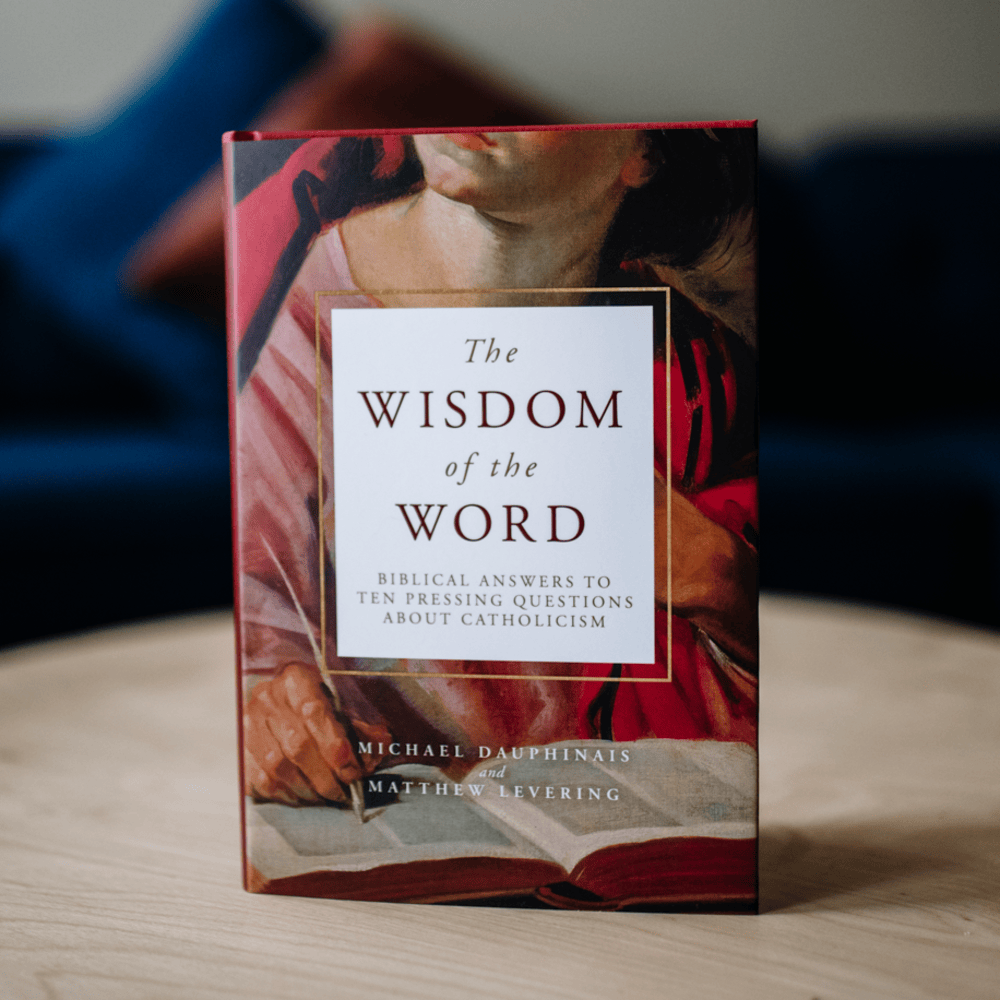 The Wisdom of the Word book cover showing a classical painting background with text about biblical answers to Catholicism, contributors Michael Dauphinais and Matthew Levering, offering biblical insight on Catholicism, hardcover 9781943243761