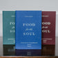 Three hardcover Catholic theology books titled "Food for the Soul - Cycle B" by Peter Kreeft in blue, green, and maroon covers displayed on a wooden surface, daily reflections on the Mass readings, suitable for prayer or Catholic gifts