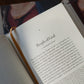 Open book showing a page from "Engaging the Doctrine of the Church" by Matthew Levering, a theology book focused on Catholic church doctrine, hardcover 9781685782221, published by Word on Fire Academic