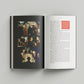 Open book spread featuring full color photographs of people gathered around a table and text discussing history and faith, inside pages of Popcorn with the Pope, by David Paul Baird, Andrew Petiprin, Michael Ward, published by Word on Fire, paperback 9781685789848