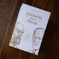 Book cover of Socrates Meets Freud by Peter Kreeft, featuring illustrated portraits of Socrates and Freud in gold lines on a white background, philosophy book, 9781685782153