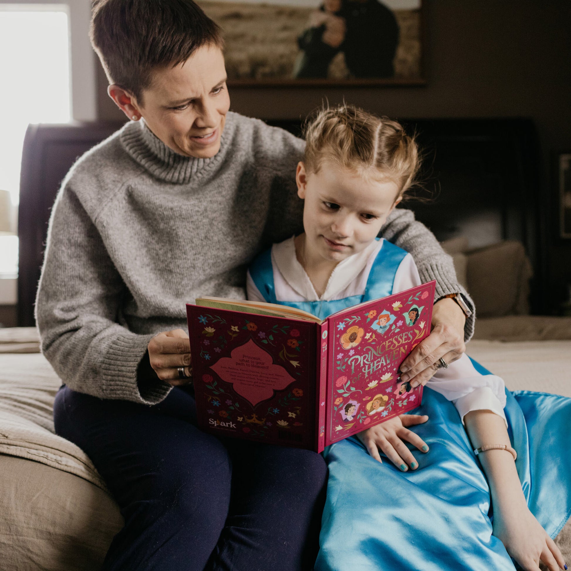 Princesses of Heaven mother and daughter reading book